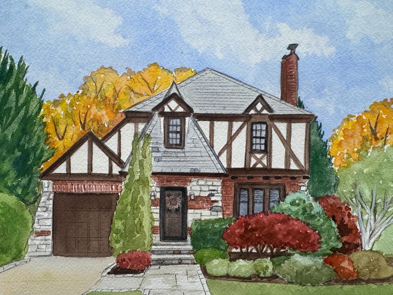 May include: Watercolor painting of a Tudor-style house with a gray roof, brick chimney, and brown trim. The house is surrounded by lush greenery and colorful autumn foliage. A garage and front door are visible.