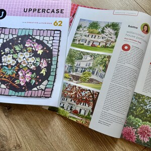 May include: A stack of magazines with the word "UPPERCASE" in pink and white. One magazine features a mosaic floral design. Another magazine displays watercolor house portraits.