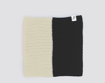 White & black knitted acrylic tube neck warmer in Montreal