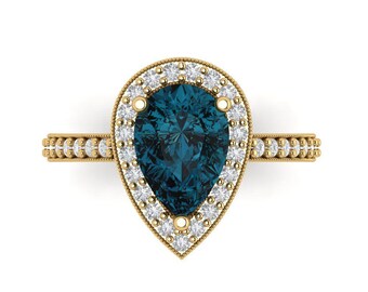 Anillo de compromiso con halo de topacio azul de Londres talla pera en oro macizo de 14 quilates – Estilo Art Déco