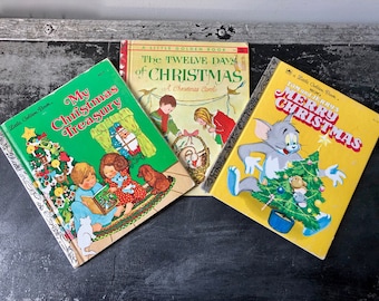 May include: Three vintage Little Golden Books with Christmas themes. The books are "My Christmas Treasury", "The Twelve Days of Christmas", and "Tom and Jerry's Merry Christmas".