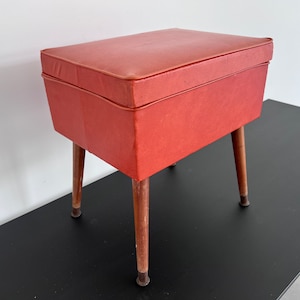 Vintage Mid-Century VINYL STORAGE BENCH, Orange Ottoman Seat with Storage, 1950s Retro Vinyl Stool with Atomic Leg, Sewing Stool