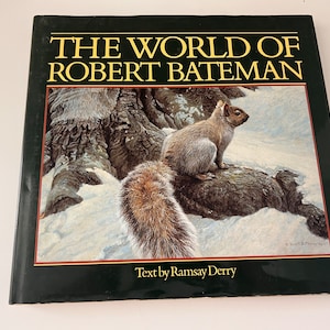 May include: The World of Robert Bateman book cover featuring a painting of a gray squirrel sitting on a tree branch in a snowy forest. The text on the cover reads "The World of Robert Bateman" and "Text by Ramsay Derry".