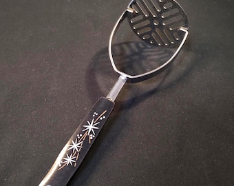 Ekco Atomic Starburst Potato Masher