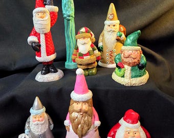 Assorted Hand-Painted Resin Santa Figurines