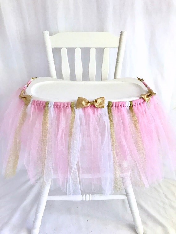 pink and white high chair