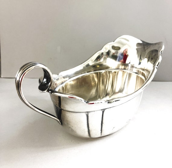 Sterling Silver Curved Spoon Earrings Polished with Rolled Edge Sterling Silver Curved Spoon Earrings Polished with Rolled Edge