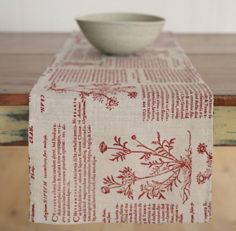 Beautiful rustic linen with red print perfect for a rustic wooden table. Currently 40% off as an overstock item with free shipping Australia wide.