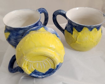Hand made mug. Porcelain. Rising Sun. One of a kind. 3.5" tall and 4" wide. Microwave,  dishwasher safe. Great gift 14oz