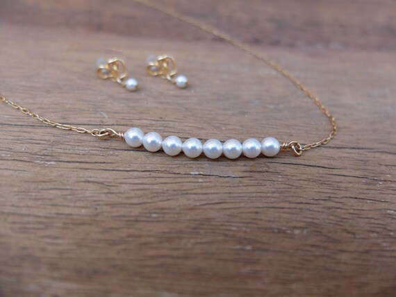 teen getting pearl necklace Teen getting pearl necklace
