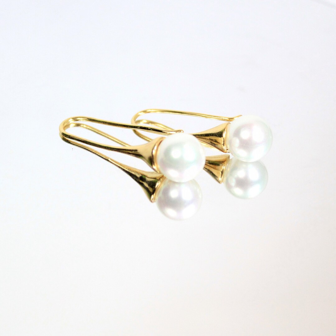 Orecchini di perle eleganti stile mozzafiato realizzati in metallo di