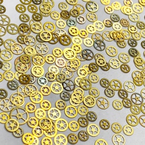 50 Tiny Flat Watch Wheels 3-4mm Gears Gold Steampunk Part Watchmaker Lot Oil Slick