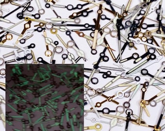 25 piezas de manecillas de reloj luminosas pintadas, piezas de manecillas de reloj negras y doradas para reparación de relojes.