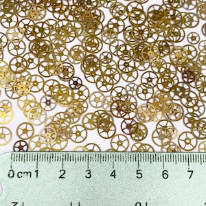 100 Flat Gold Watch Wheels 6-8mm Altered Art Part Gears Steampunk Watchmaker Lot