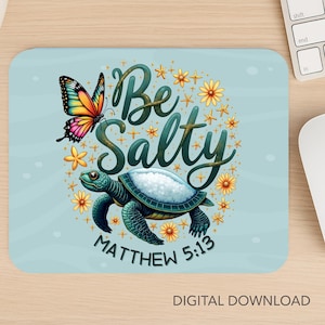 May include: A light blue mousepad featuring a colorful butterfly and a sea turtle. The words "Be Salty" are written in a decorative font, surrounded by flowers. The text "Matthew 5:13" is also present.