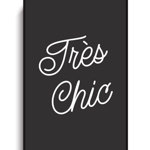 May include: Black and white typography print with the text "Tr&egrave;s Chic" in a cursive font.