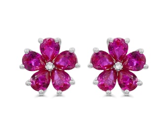 Created Ruby and Diamond Accent Floral Stud Earrings in Sterling Silver