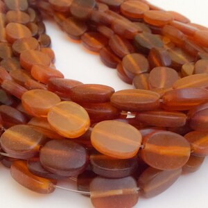 Golden horn beads 10x14 flat oval 16" strand