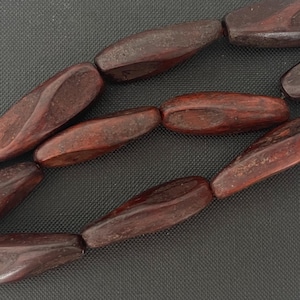 1 Inch Wood Faceted Oval Beads