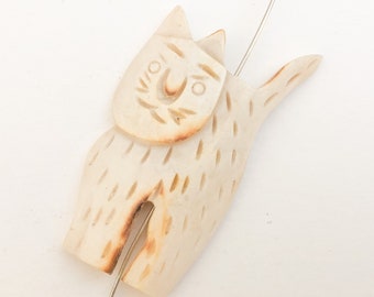 Carved bone bead pendant cat