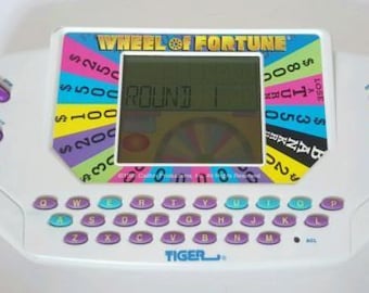 Wheel of Fortune Hand Held Electronic Game TIGER 1995 WORKS