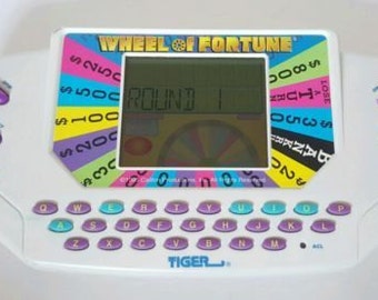 Wheel of Fortune Hand Held Electronic Game TIGER 1995 WORKS