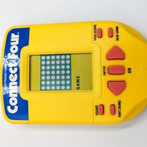 Milton Bradley MB 1995 Electronic Hand Held Connect Four 4 Game