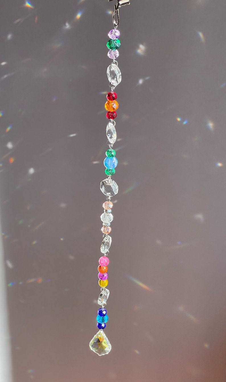 Crystal sun catcher stand with the leaf style prism end