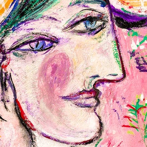May include: A colorful abstract painting of a woman's face with blue eyes and pink cheeks. The background is a pink and green floral pattern.