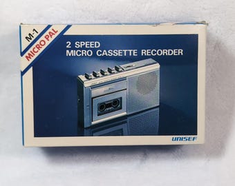 Grabadora de microcasetes UNISEF M-1 Micro Pal vintage, nueva en caja, de stock antiguo, rara.
