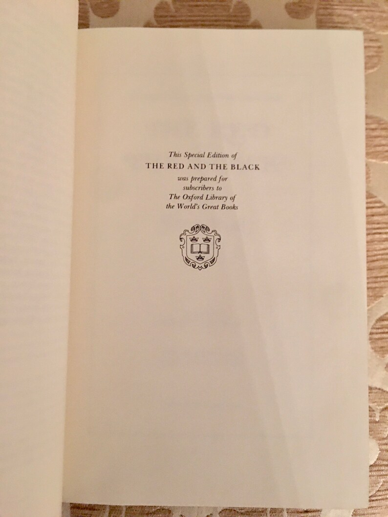 May include: A white page with black text announcing a special edition of "The Red and the Black" prepared for subscribers to "The Oxford Library of the World's Great Books".