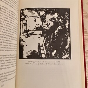 May include: A black and white illustration of a person climbing a ladder up to a window. The illustration is from a book and includes the text "Climbing from terrace to terrace, he was quickly under the window of Madame de Renal's sleeping-room."