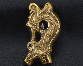 Réplica del broche del dragón vikingo