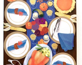 May include: A festive Thanksgiving dinner table illustration featuring a roasted turkey, pumpkin pie, green beans, corn, and bowls of fruit. The table is set with white plates, blue napkins with red berry accents, silverware, and lit candles on a dark wood surface.