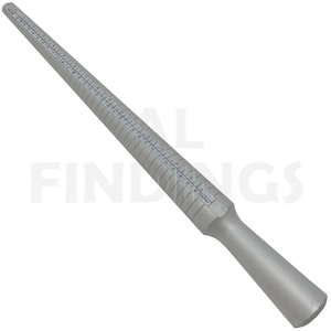 May include: A silver metal ring sizer with a graduated scale of ring sizes from 0 to 13. The sizer is approximately 12 inches long and has a handle at one end.
