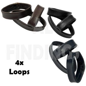 May include: Four leather loops in brown and black. The loops are interlocked and are a great way to organise cords, cables, or other small items.