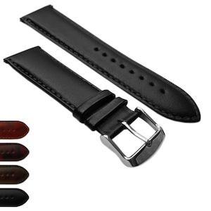 Peut inclure: Bracelet de montre en cuir noir avec boucle argentée. Le bracelet est présenté en deux parties, avec des coutures sur les bords. Une palette de couleurs de bracelets de montre marron, marron foncé et noir est également visible.