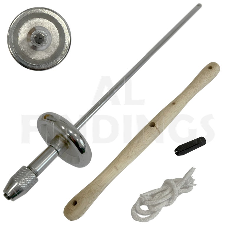 May include: A silver metal tool with a wooden handle, a small metal piece, and a white rope. The tool has a metal rod with a round knob at the top and a small metal piece at the bottom. The wooden handle is about 12 inches long. The small metal piece is about 1 inch long. The white rope is about 1 foot long.