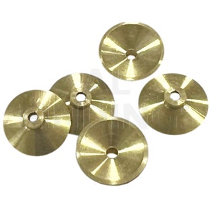 May include: Five gold-colored metal cones with a small hole in the center. The cones are arranged in a cluster on a white background.