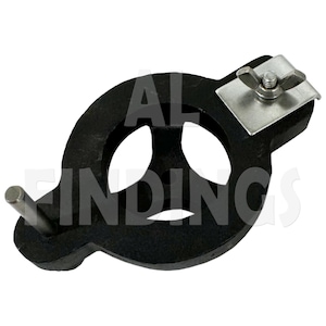 May include: Black metal ring with three holes and a wing nut. The ring has a metal pin protruding from the side.