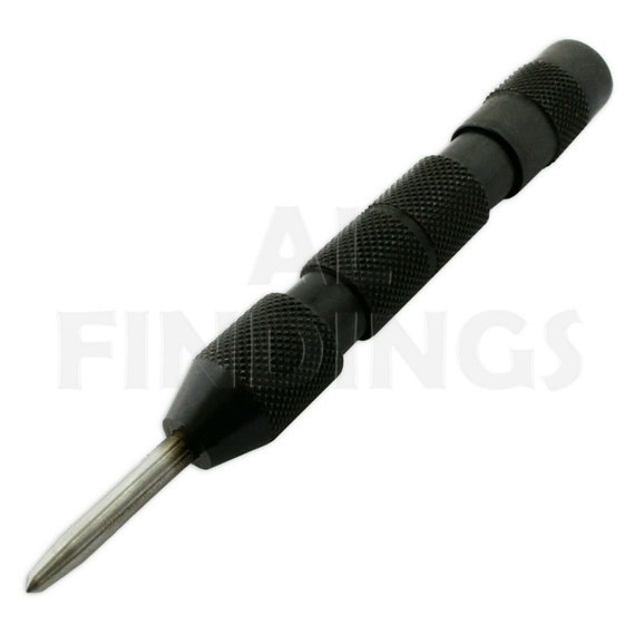 Automatic center outlet punch for metal