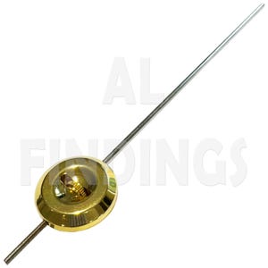 May include: A clock pendulum featuring a gold-coloured disc and a silver-coloured rod. The disc has a central screw and a clear cover. The text "AL FINDINGS" is partially visible in the background.