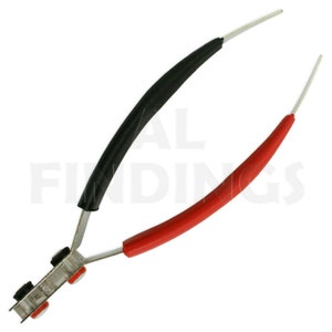 May include: A pair of red and black insulated tweezers with a silver metal head. The tweezers are used for holding small objects.