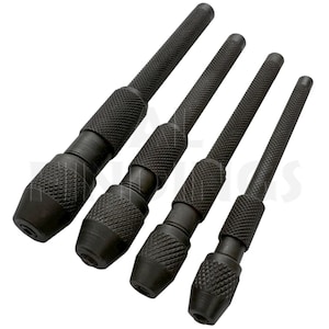 May include: Four black hand drill chucks with textured handles and drill bit holders. The tools are arranged diagonally, showcasing their design and construction. The chucks are made of metal and appear durable.