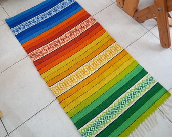 Handwoven striped wool rug in green, yellow, orange and blue shades, colorful boho rug