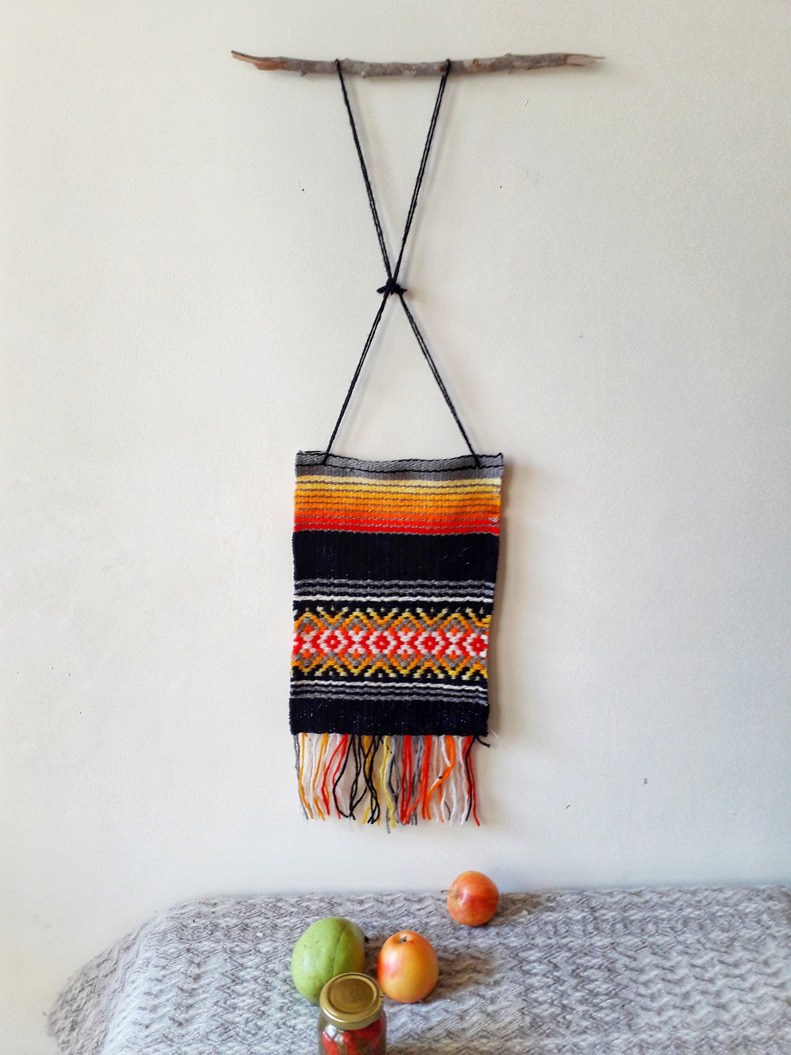 Woven black wall hanging with 8 shades red orange and yellow Etsy