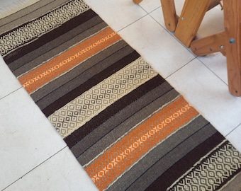 Handwoven striped wool rug in white and brown natural colors and orange accents, handmade rug for you home decor