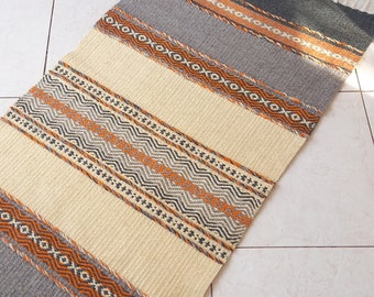 Handwoven striped wool rug in dark grey, light grey, white natural colors and orange accents, handmade rug for you home decor