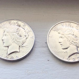 Two Vintage 1922 1923 U.S. Peace Silver Dollar Coins