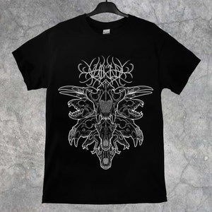 May include: Black t-shirt featuring a white graphic design of a skull surrounded by multiple animal skulls. The design is intricate and detailed, with a gothic style.